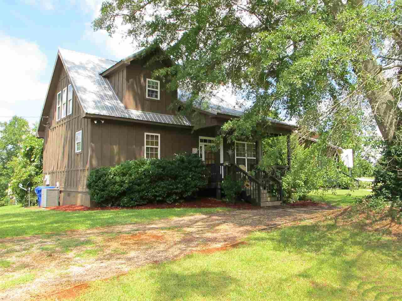 small cabin house plan tin roof